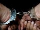 دستبند پلیس بر دستان عامل قتل دو برادر جیرفتی